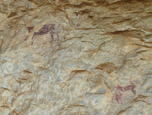 Deer or Elk like petroglyph and tracks.